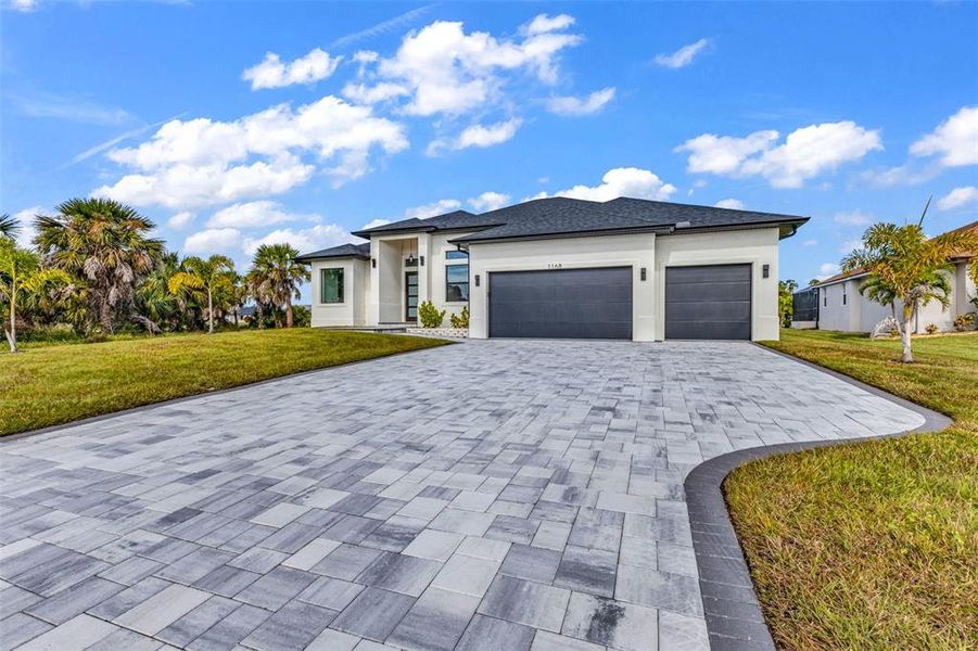 Front exterior of a new home in , Rotonda West, FL, highlighting curb appeal (Image 27). Front exterior of a new home in , Rotonda West, FL, highlighting curb appeal (Image 27).