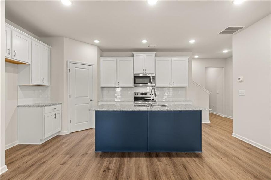 Furnished interior view inside a new home in Lake Carlton, Loganville (Image 5).