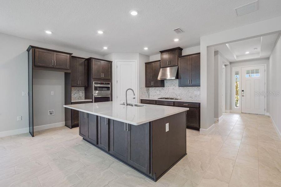 Furnished interior view inside a new home in Ardisia Park, New Smyrna Beach (Image 14).