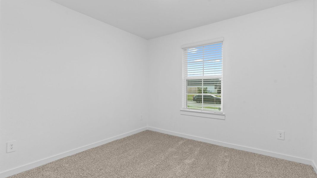 Spacious, unfurnished interior of a new home in Caldwell Crossing, Iowa Colony (Image 17).