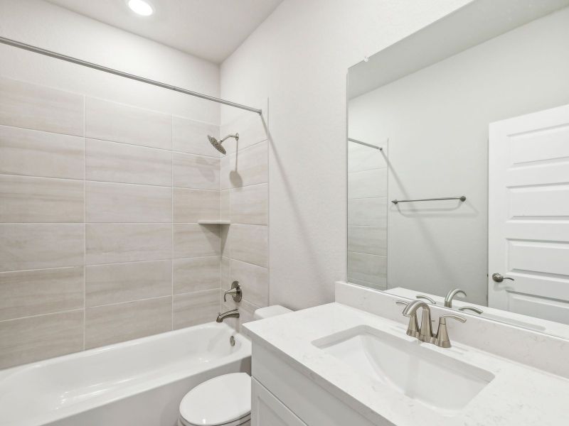 Furnished interior view inside a new home in Riverbend at Double Eagle - Boulevard Collection, Cedar Creek (Image 4).