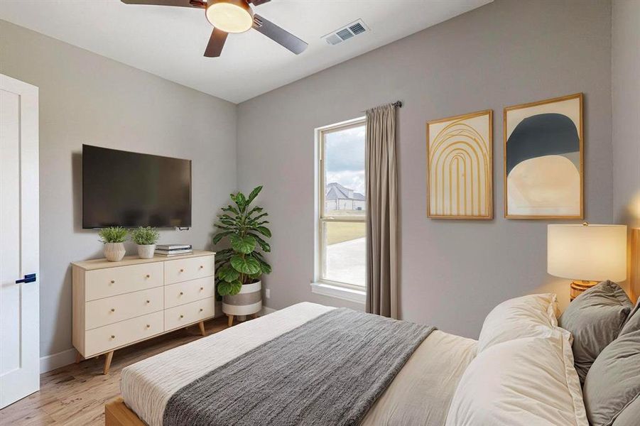 Virtual Staged Bedroom featuring light wood-type flooring and ceiling fan