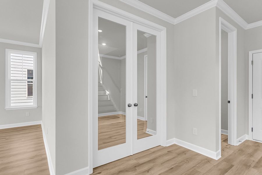 Spacious, unfurnished interior of a new home in Pineland Preserve, Summerville (Image 22).