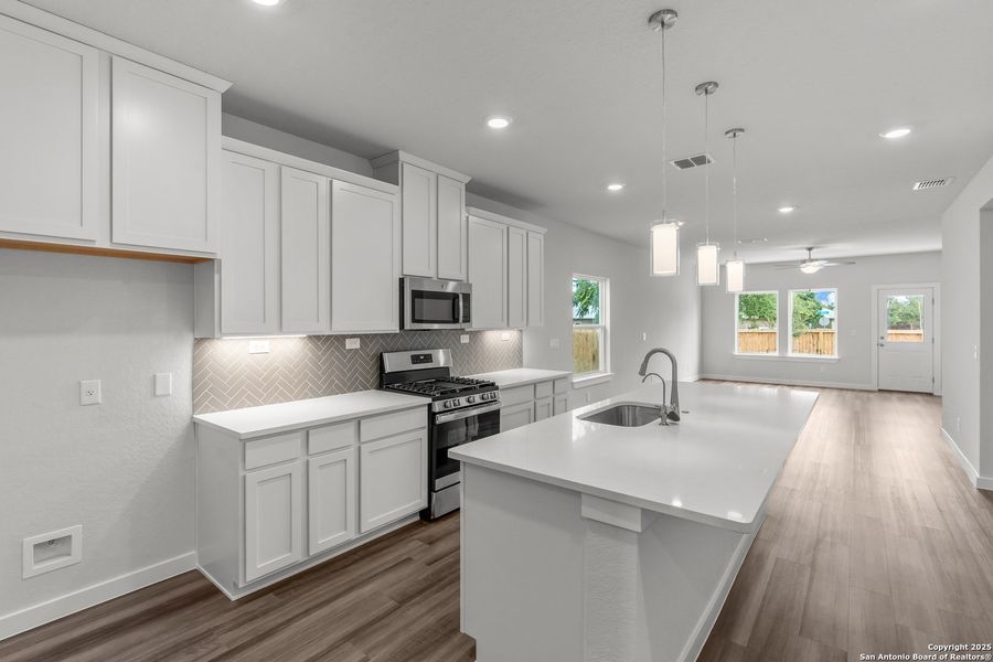 Furnished interior view inside a new home in August Fields, New Braunfels (Image 3).