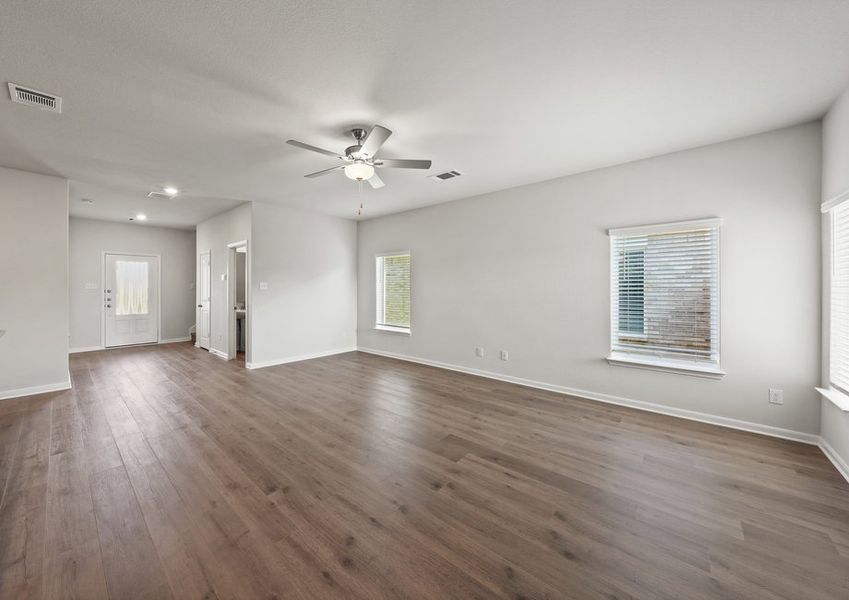 The living room has ample room for furniture, so everyone can have a seat. The living room has ample room for furniture, so everyone can have a seat.