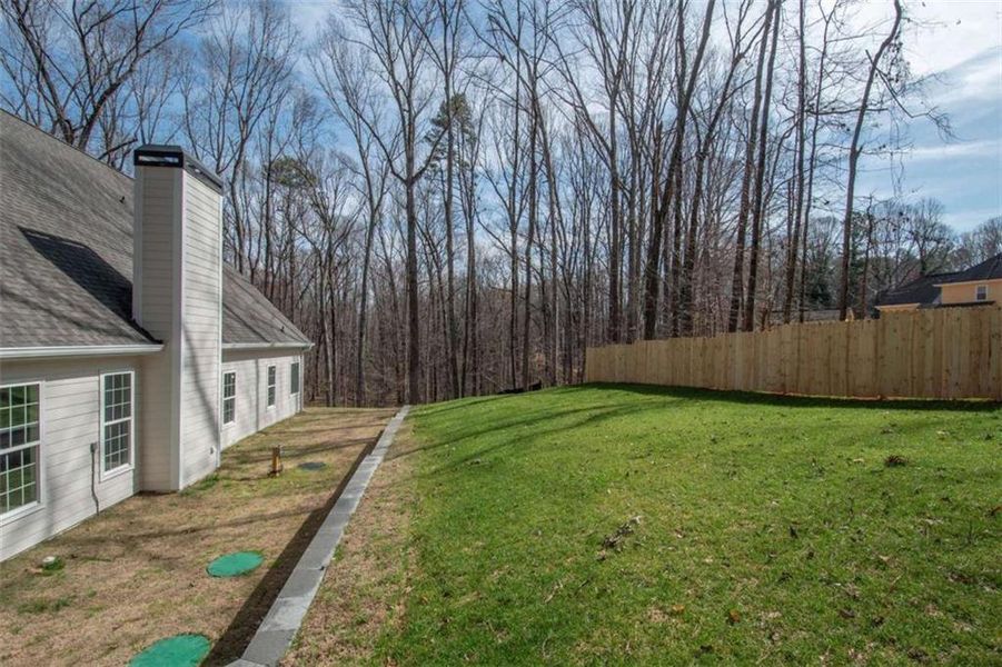 Front exterior of a new home in , Jonesboro, GA, highlighting curb appeal (Image 35).