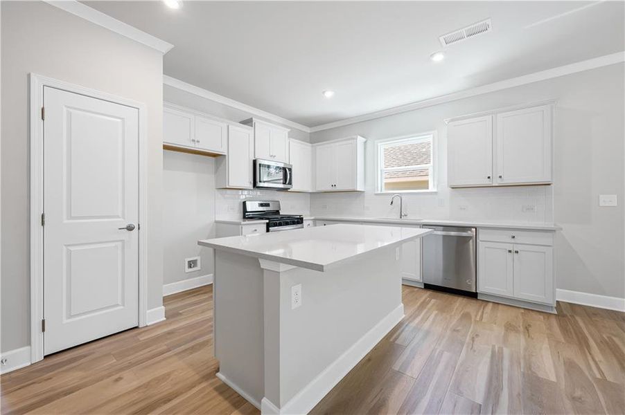 Furnished interior in a model home at Enclave at Parkway Village in Fairburn (Image 8).