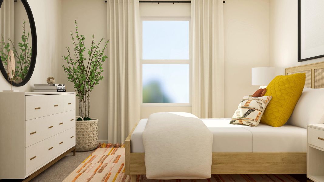 A white couch with a yellow pillow.