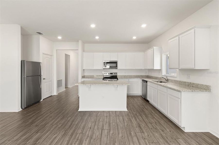 Furnished interior view inside a new home in Peach Crossings, Winter Haven (Image 5). Furnished interior view inside a new home in Peach Crossings, Winter Haven (Image 5).