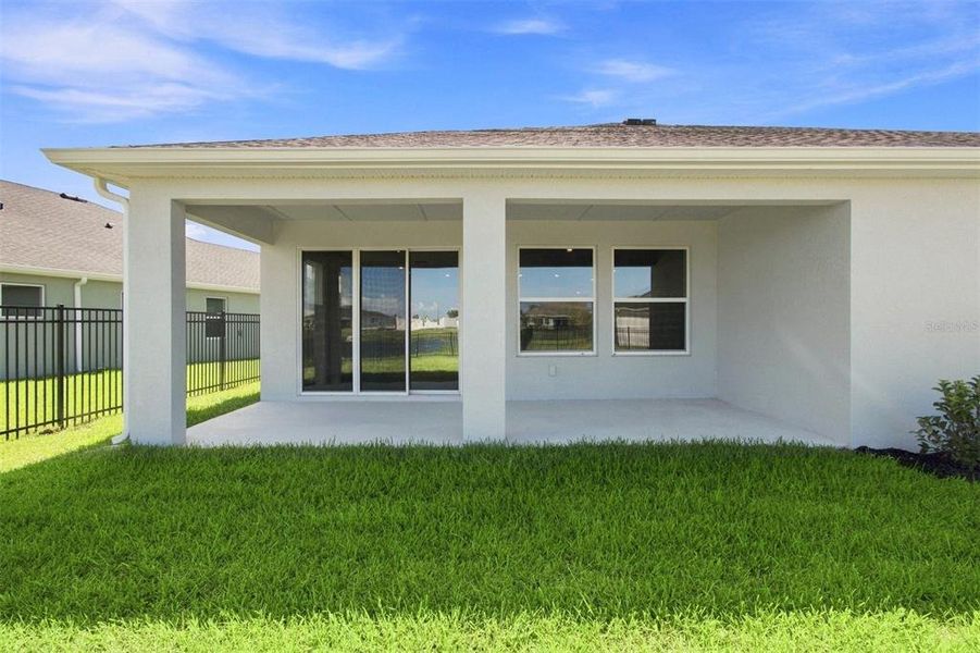 Exterior details and patio area of a home in Coasterra, Palmetto (Image 20).