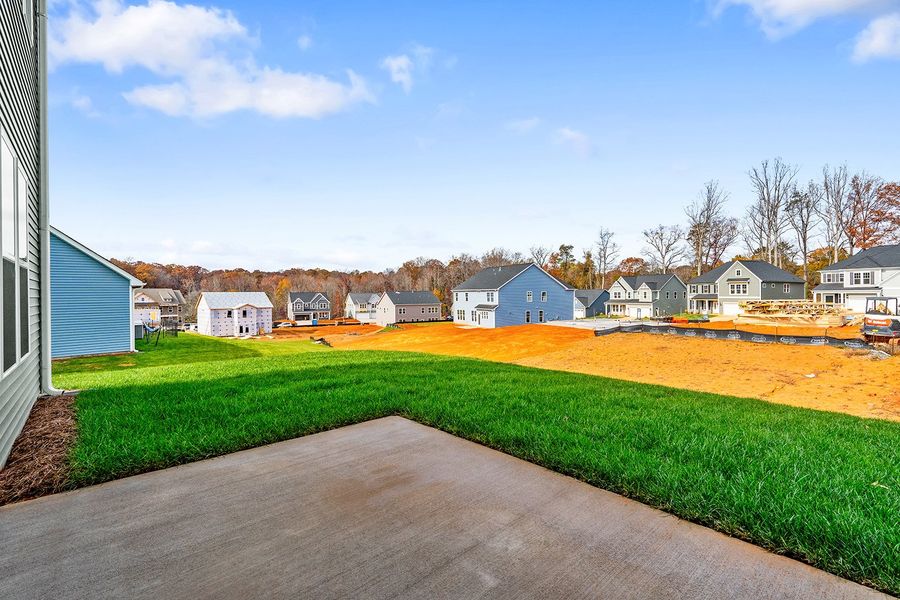 Exterior details and patio area of a home in Hanes Lake, Winston-Salem (Image 3).