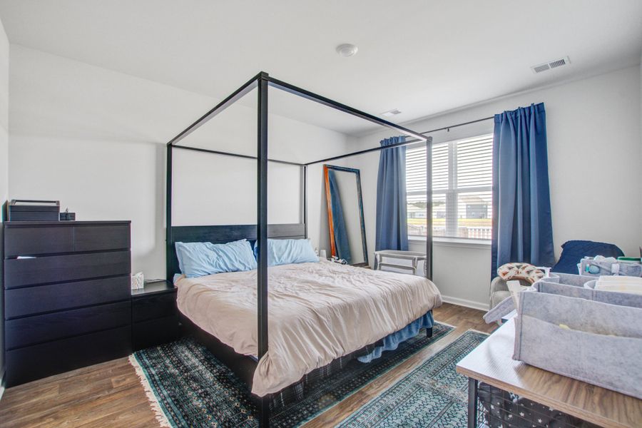 Furnished interior view inside a new home in Pine Hills at Cane Bay, Summerville (Image 18).