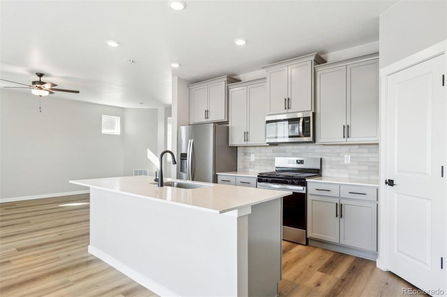 Furnished interior view inside a new home in , Commerce City (Image 7).
