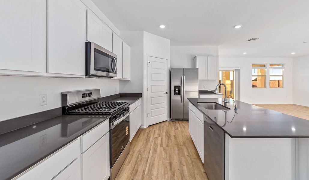 Representative furnished interior of a home built from the Dalea by D.R. Horton in Barnett Village, Marana (Image 7).