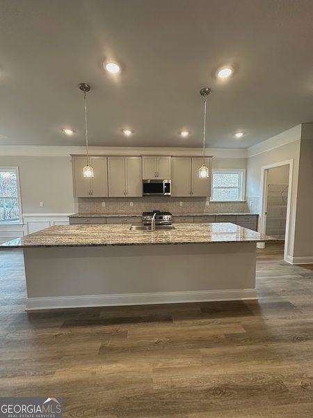 Furnished interior view inside a new home in Mirror Lake at South Harbour, Villa Rica (Image 7).
