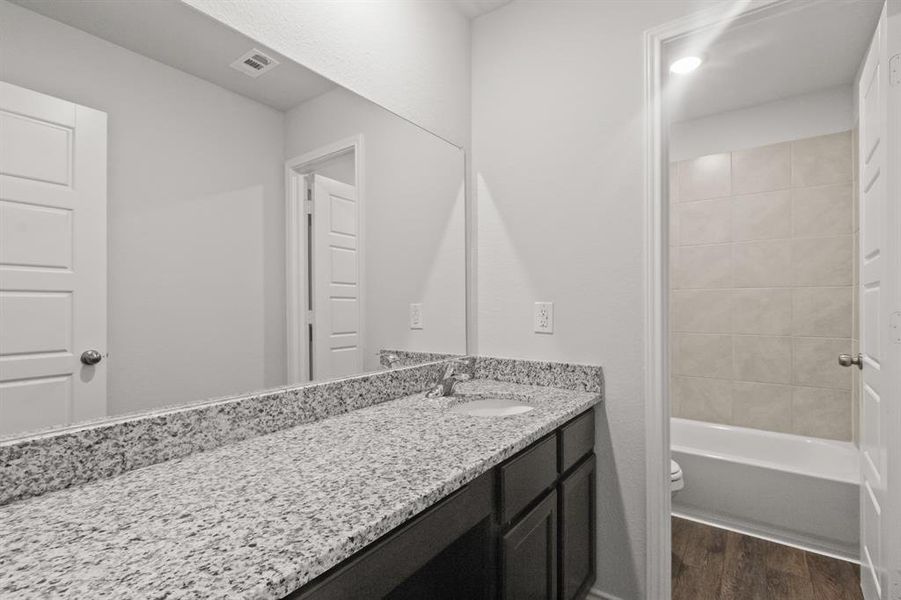 Furnished interior view inside a new home in Christian Meadows, Ennis (Image 7).