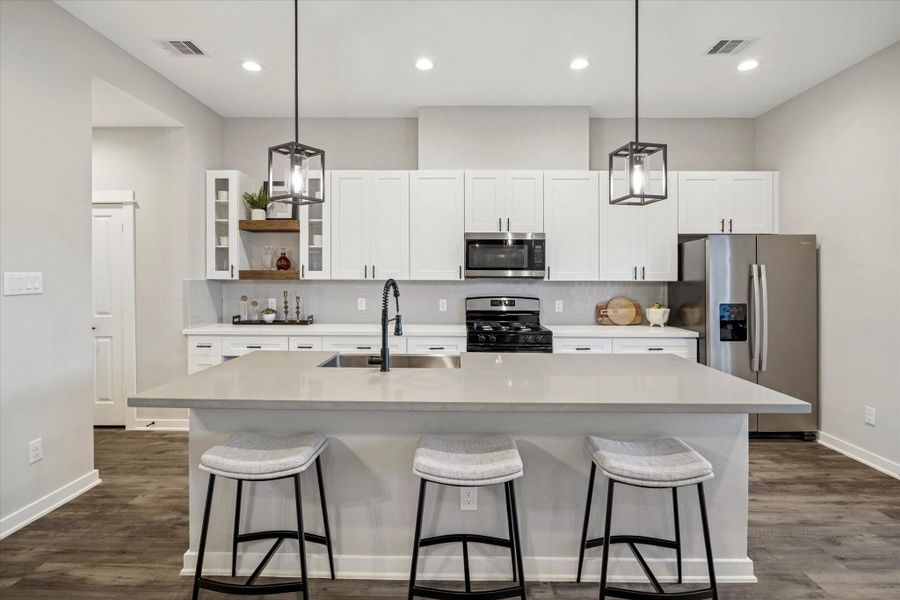 *Photos are of model home located in the community to reference finishes*