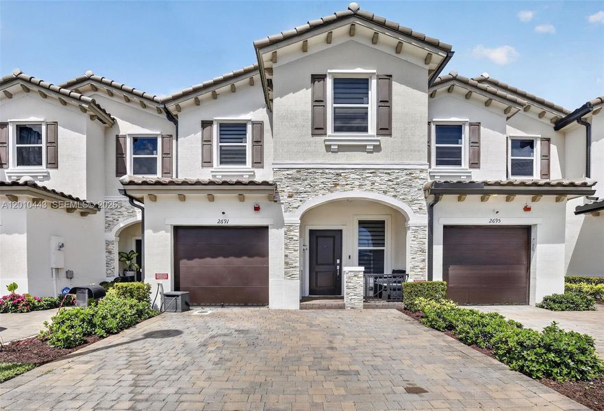 Front exterior of a new home in , Lauderhill, FL, highlighting curb appeal (Image 27).