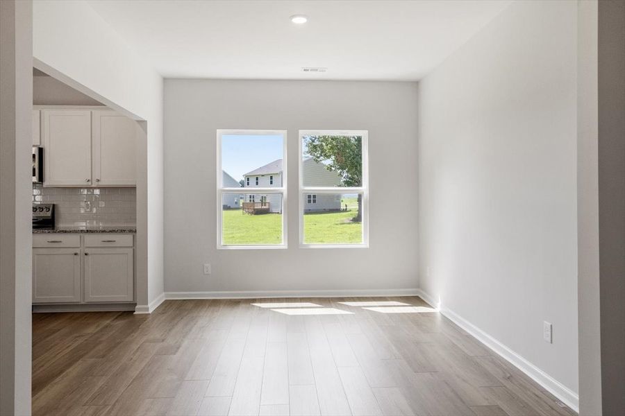 Spacious, unfurnished interior of a new home in Cambridge Reserve, Angier (Image 18).