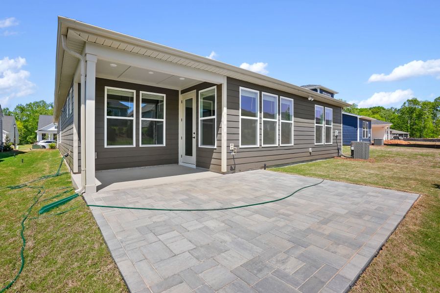 Exterior details and patio area of a home in Carolina Riverside, Belmont (Image 29).