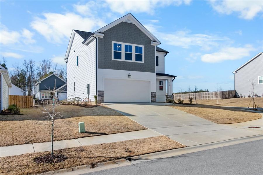 Front exterior of a new home in Tillery Park, Grovetown, GA, highlighting curb appeal (Image 19).