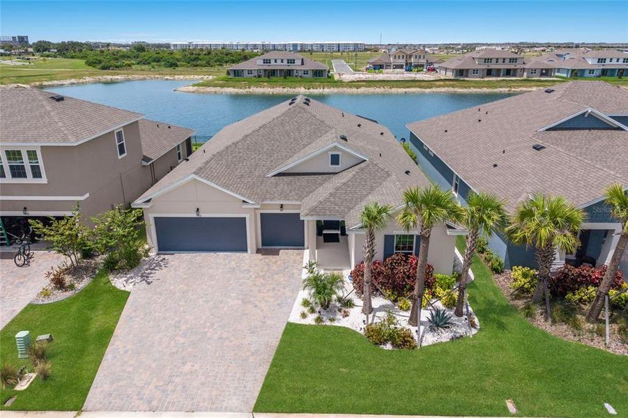 Front exterior of a new home in Seaire, Parrish, FL, highlighting curb appeal (Image 23). Front exterior of a new home in Seaire, Parrish, FL, highlighting curb appeal (Image 23).
