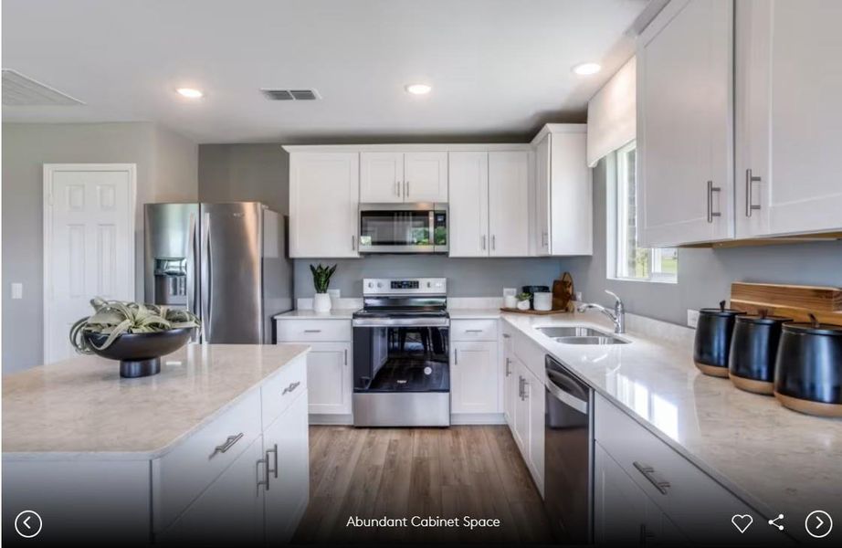 Interior photos- Photo of Pulte model home with same floor plan, not of actual home listed.