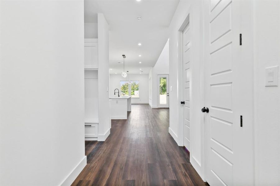 Hall featuring dark hardwood / wood-style flooring