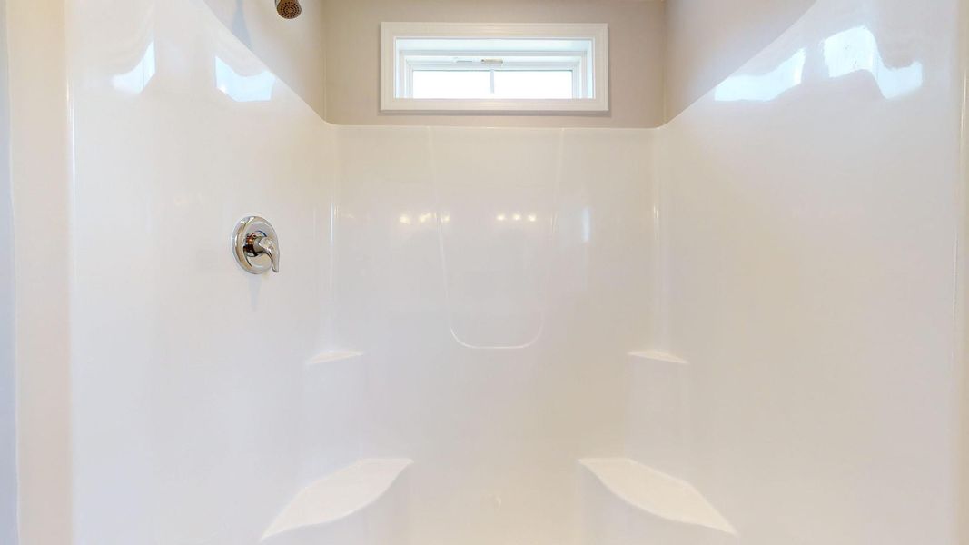 Representative furnished interior of a home built from the Tyler A by JC Jackson Homes,LLC in Heritage Pointe, Newport (Image 10).