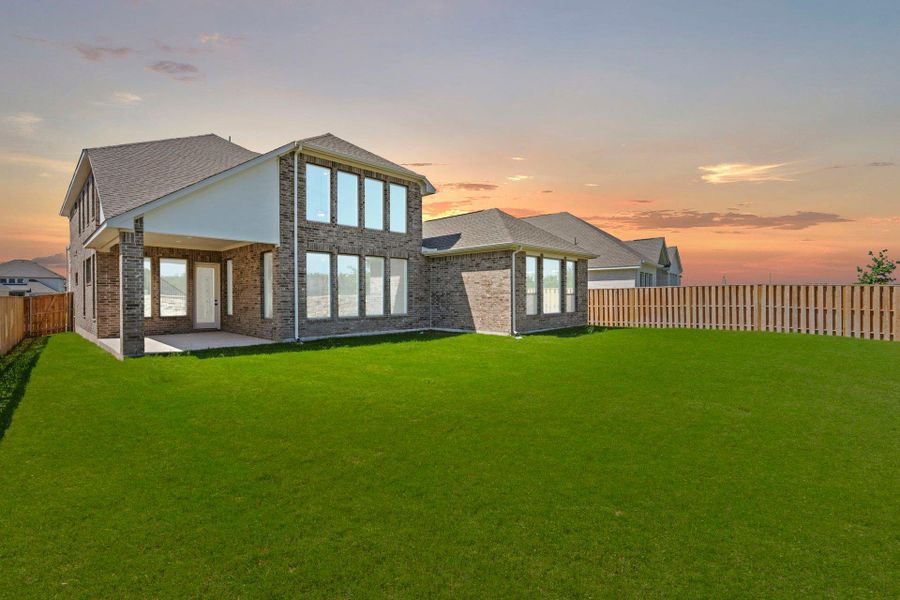 Rear of Home and Private Backyard