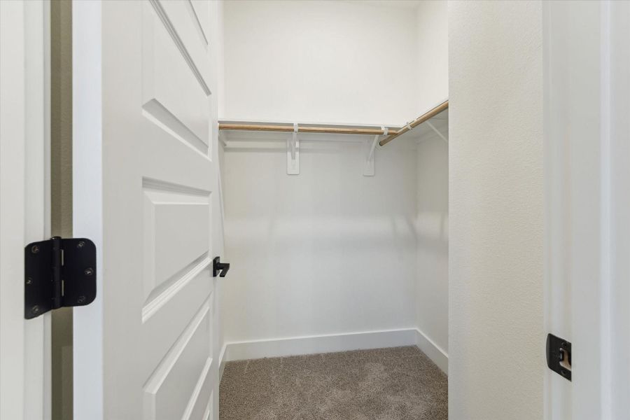 Secondary bedroom closet *picture is of a previously constructed home by the builder. 812 Thornton finishes will be very similar but this photo is meant to show craftsmanship, quality and to show a product very similar to the plan for 812 Thornton. However, the builder has the right to change finishes at their sole discretion. Secondary bedroom closet *picture is of a previously constructed home by the builder. 812 Thornton finishes will be very similar but this photo is meant to show craftsmanship, quality and to show a product very similar to the plan for 812 Thornton. However, the builder has the right to change finishes at their sole discretion.