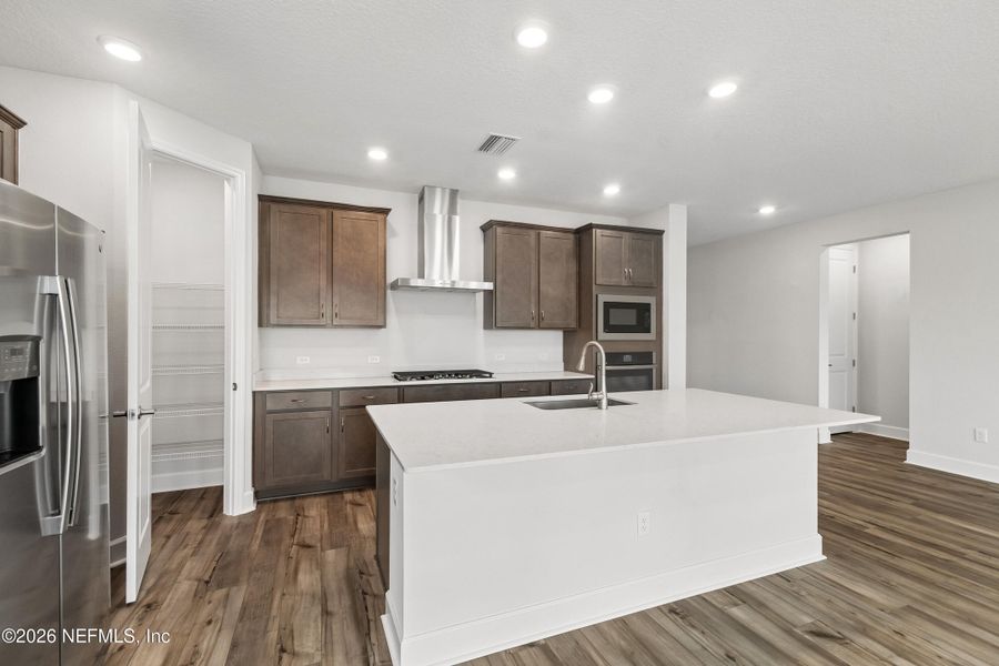 Furnished interior view inside a new home in Tributary 50', Yulee (Image 13).