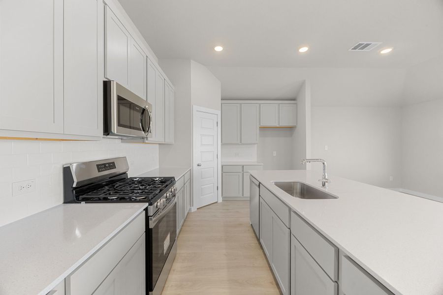 Furnished interior view inside a new home in Prairie Winds, Hutto (Image 7).