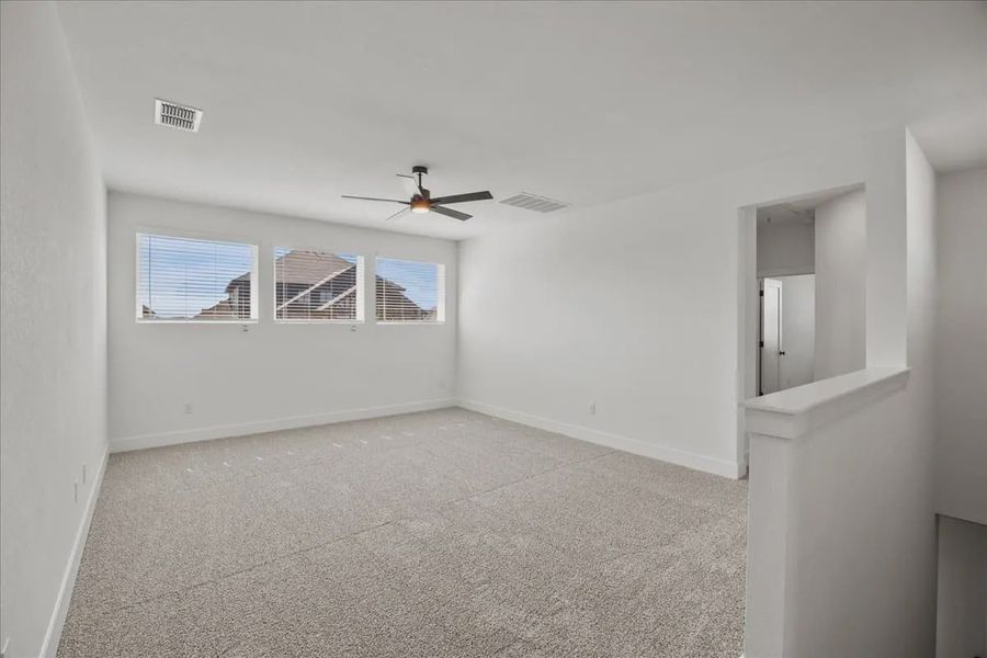 Representative unfurnished interior of a home built from the Courtney by Chesmar Homes in 6 Creeks, Kyle (Image 13).