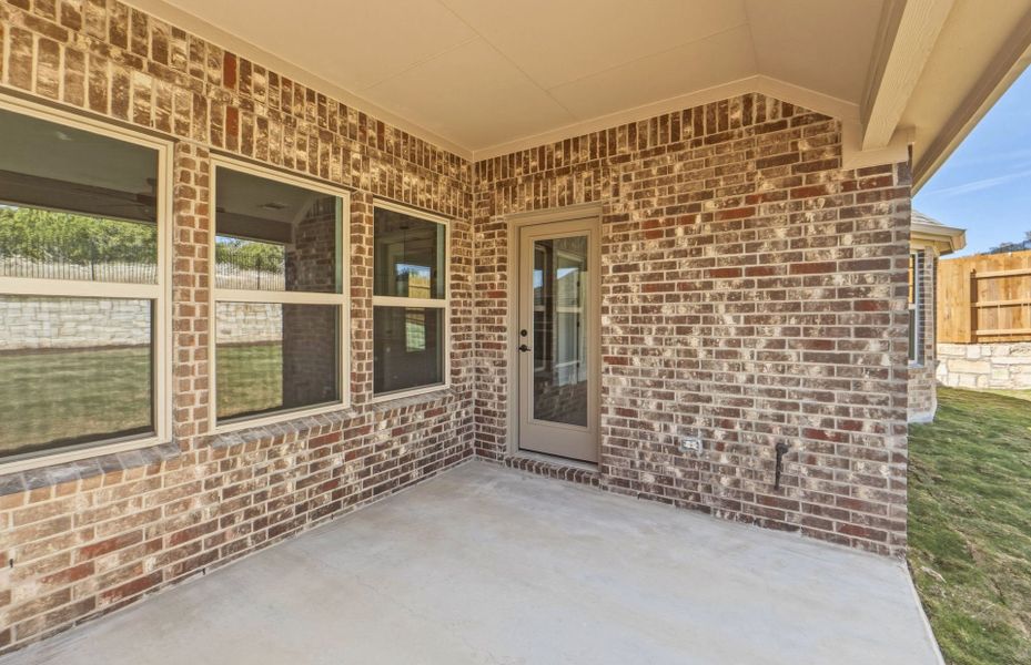 Exterior details and patio area of a home in West Cypress Hills, Spicewood (Image 24). Exterior details and patio area of a home in West Cypress Hills, Spicewood (Image 24).
