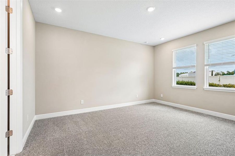 Spacious, unfurnished interior of a new home in Legends Preserve - Signature Series, Daytona Beach (Image 31).