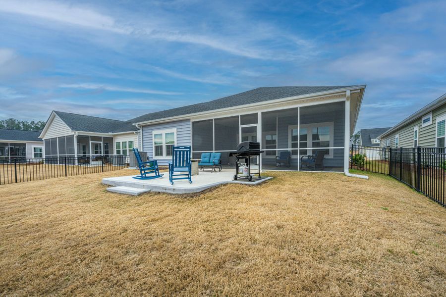 Exterior details and patio area of a home in Horizons at Summers Corner | 55+, Summerville (Image 27).