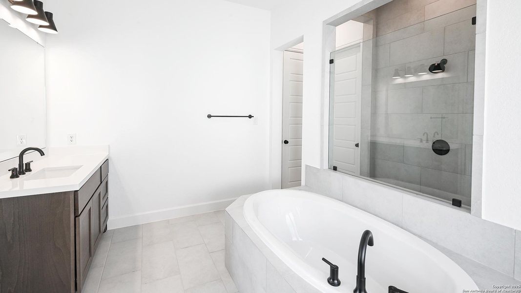 Furnished interior view inside a new home in Homestead 65', Schertz (Image 4).