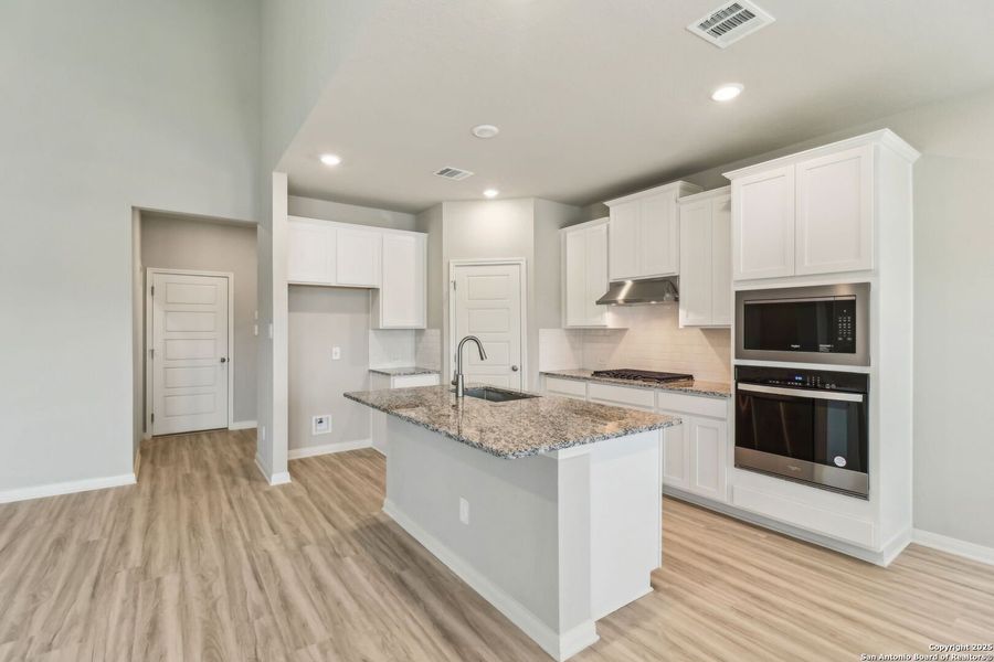 Furnished interior view inside a new home in Autry Pond, San Antonio (Image 11). Furnished interior view inside a new home in Autry Pond, San Antonio (Image 11).