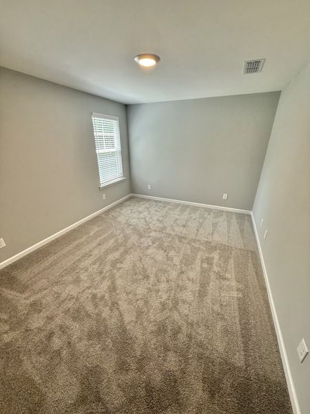 Spacious, unfurnished interior of a new home in Stonehenge, Manchester (Image 9). Spacious, unfurnished interior of a new home in Stonehenge, Manchester (Image 9).