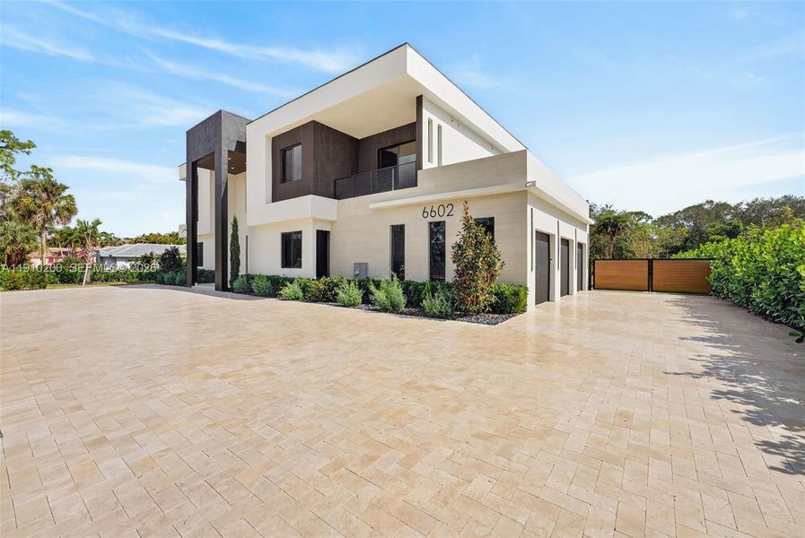 Front exterior of a new home in , Parkland, FL, highlighting curb appeal (Image 27).