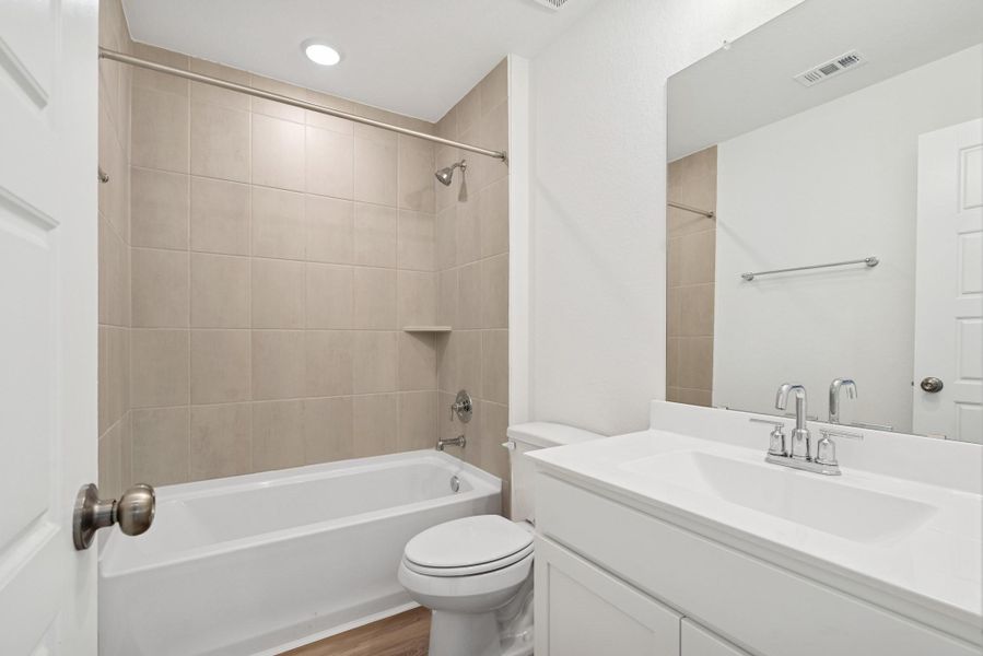 Furnished interior view inside a new home in Pinewood at Grand Texas, New Caney (Image 6).