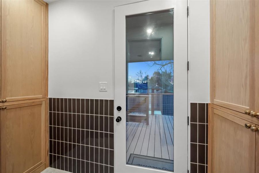 Mud Room / Pantry - tons of storage space is offered in the custom site built cabinetry in this space next to the Kitchen