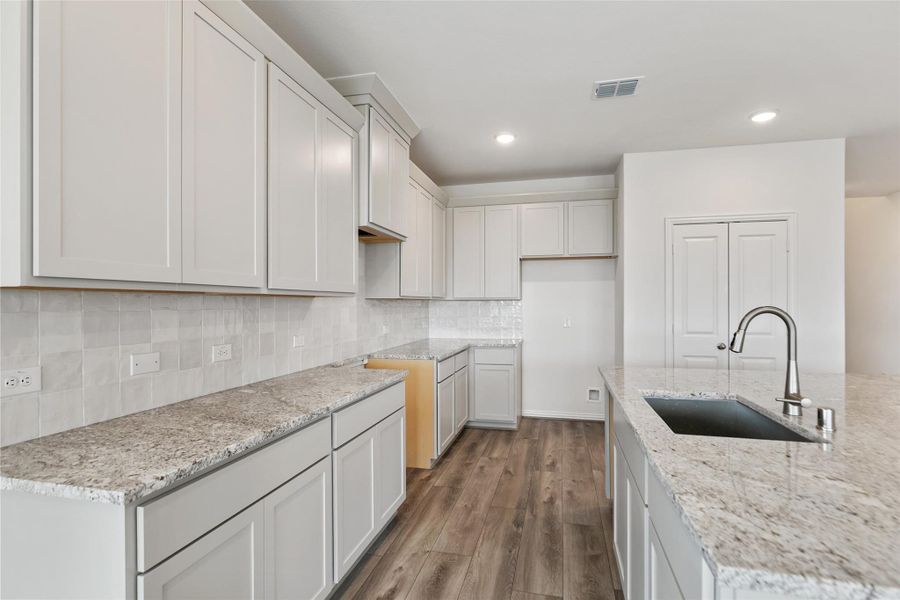 Furnished interior view inside a new home in Aldeana, Bonney (Image 12).