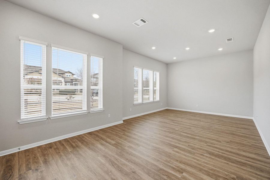 Unfurnished room featuring light wood-type flooring and recessed lighting