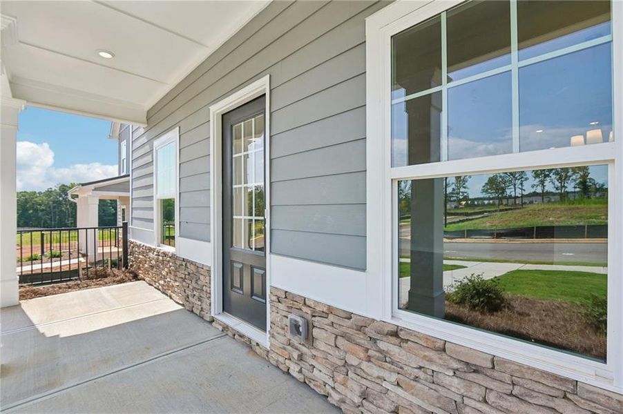 Exterior details and patio area of a home in Magnolia Trace, Flowery Branch (Image 4).