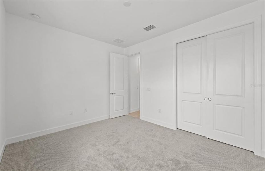 Spacious, unfurnished interior of a new home in Reagan Landing, Bradenton (Image 27). Spacious, unfurnished interior of a new home in Reagan Landing, Bradenton (Image 27).
