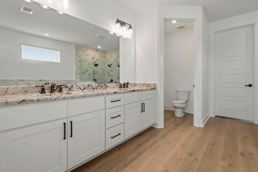 Dual sink vanity in the master bathroom.