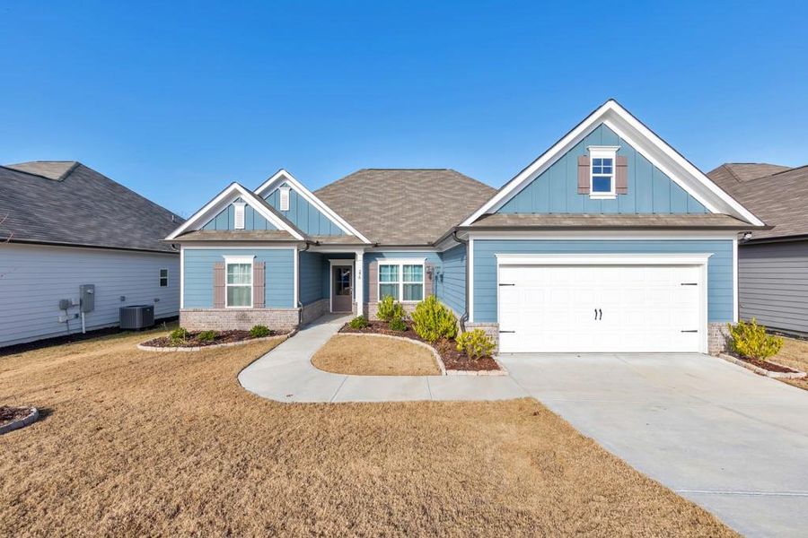 Front exterior of a new home in , Dawsonville, GA, highlighting curb appeal (Image 1).