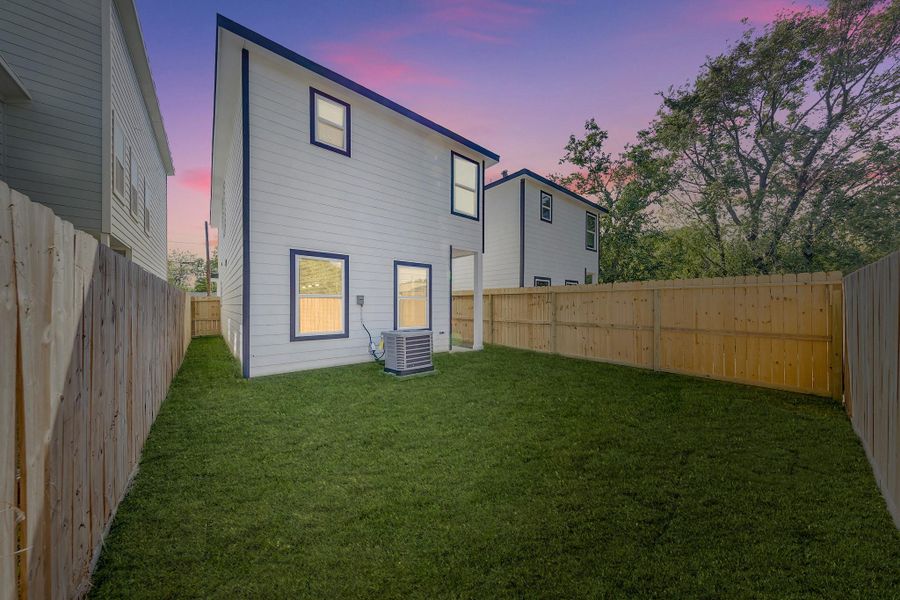 With the added peace of mind that comes with a secure enclosure, this backyard is perfect for both relaxation and recreation.